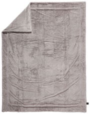 Graue Felldecke ausgebreitet, Draufsicht mit umgeschlagener Ecke