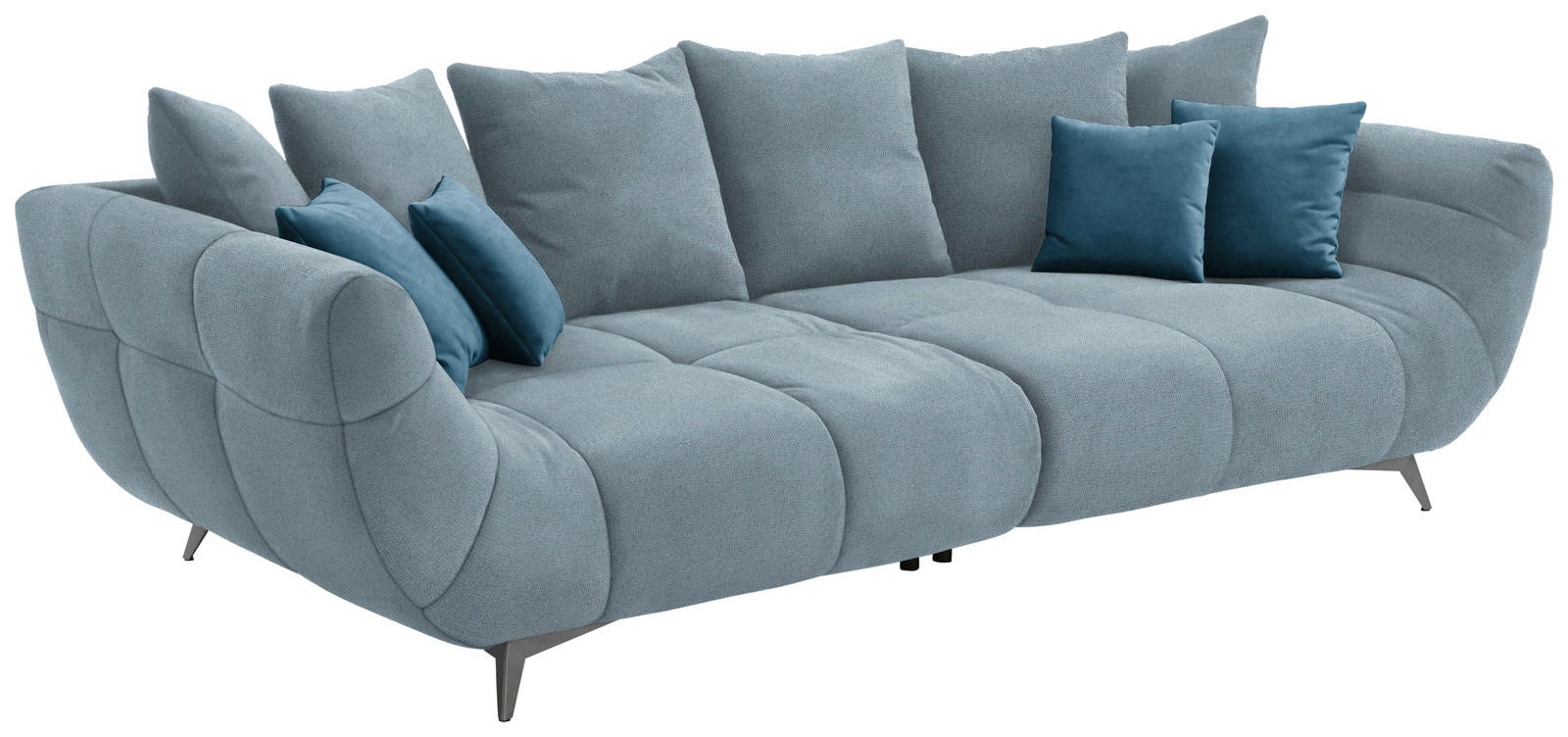 Hom´in Big Sofa FELLINI II. Großes, modernes Sofa in hellblauem Stoff mit mehreren Kissen, seitliche Perspektive