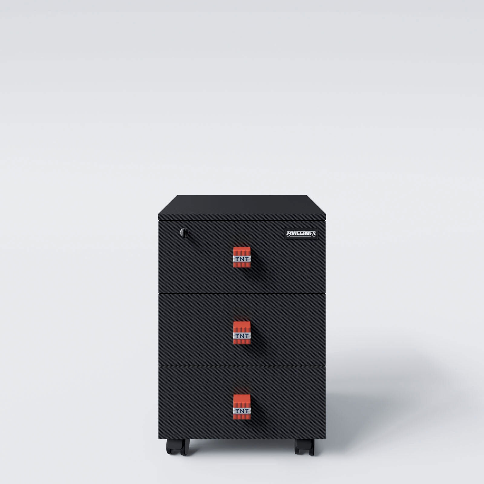 Schwarzer Rollcontainer mit drei Schubladen in Carbon-Optik, Minecraft-Logo und roten TNT-Emblemen, frontal aus leicht erhöhter Perspektive vor hellem Hintergrund.