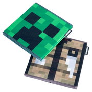 Zwei gefaltete Minecraft-Handtücher mit Pixel-Design (grünes Creeper-Gesicht und braunes Motiv) in schräger Draufsicht auf weißem Hintergrund