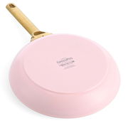 Rosa Pfanne mit goldenem Griff, Ansicht von unten