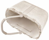 Beige Einkaufskorb mit weichem Stoff und stabilem Griff, von oben betrachtet.