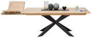 Moderner Esstisch mit Ausziehfunktion, Holzplatte und schwarzem Kreuzfußgestell, seitliche Perspektive