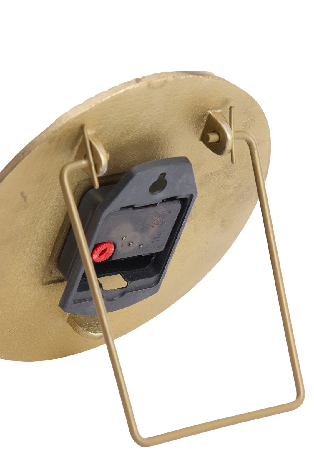 Rückansicht einer goldenen Uhr mit Ständer und Batteriefach