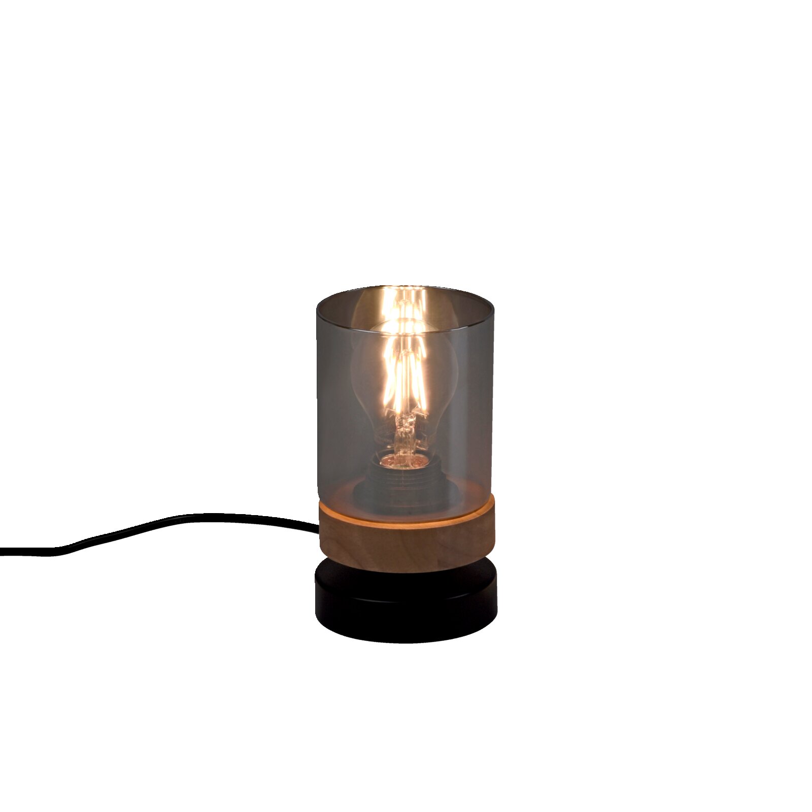 Moderne Tischlampe mit rauchgrauem Glaszylinder, sichtbarer leuchtender Filament-Glühbirne und Holzsockel auf grauem Untergrund, Frontansicht leicht von oben