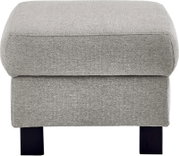 Gepolsterter Hocker/Fußhocker mit grauem Stoffbezug und schwarzen Beinen, frontal von vorne fotografiert.