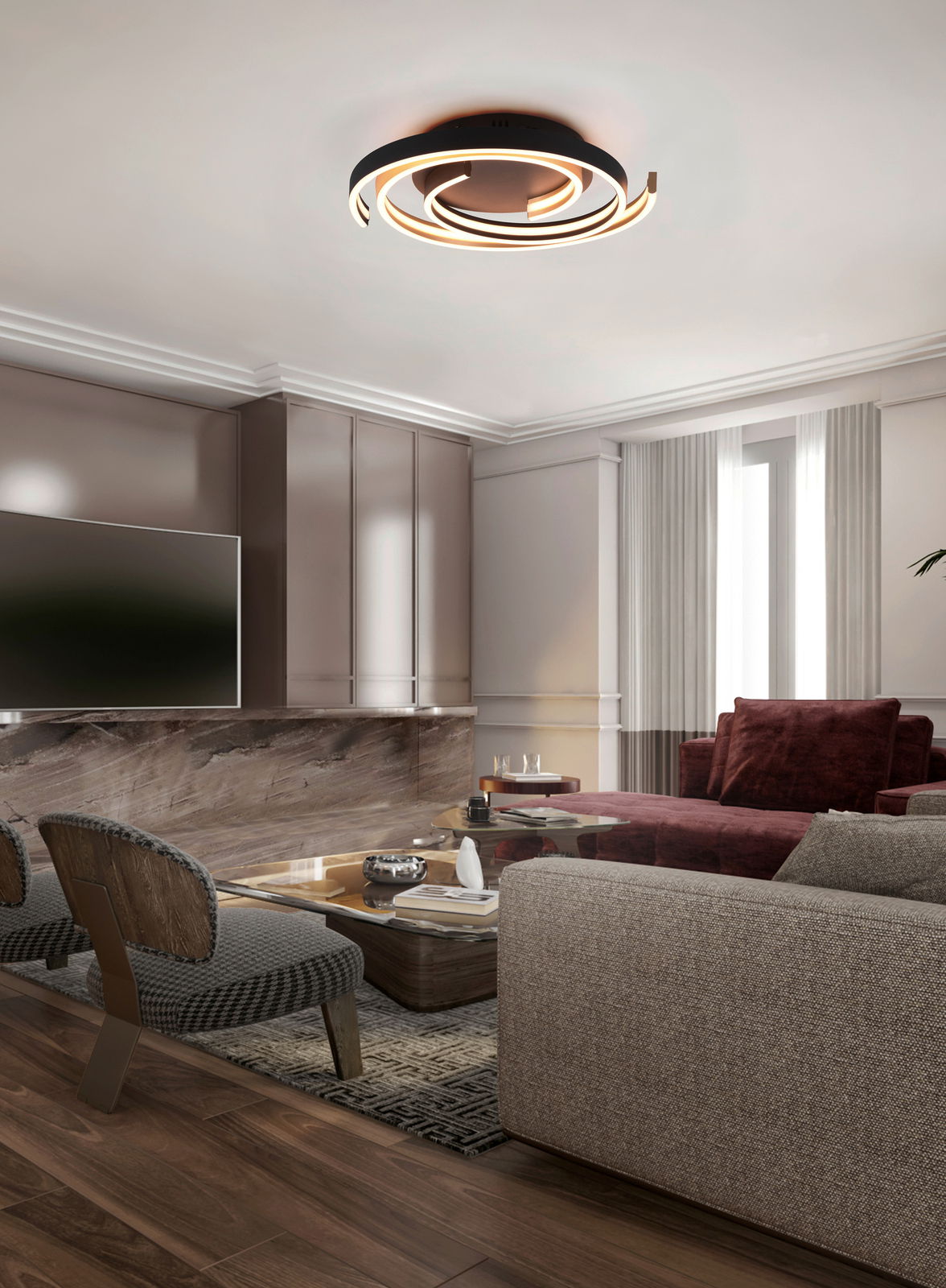 Moderne LED-Deckenleuchte CAYA in einem stilvollen Wohnzimmer, von unten betrachtet.