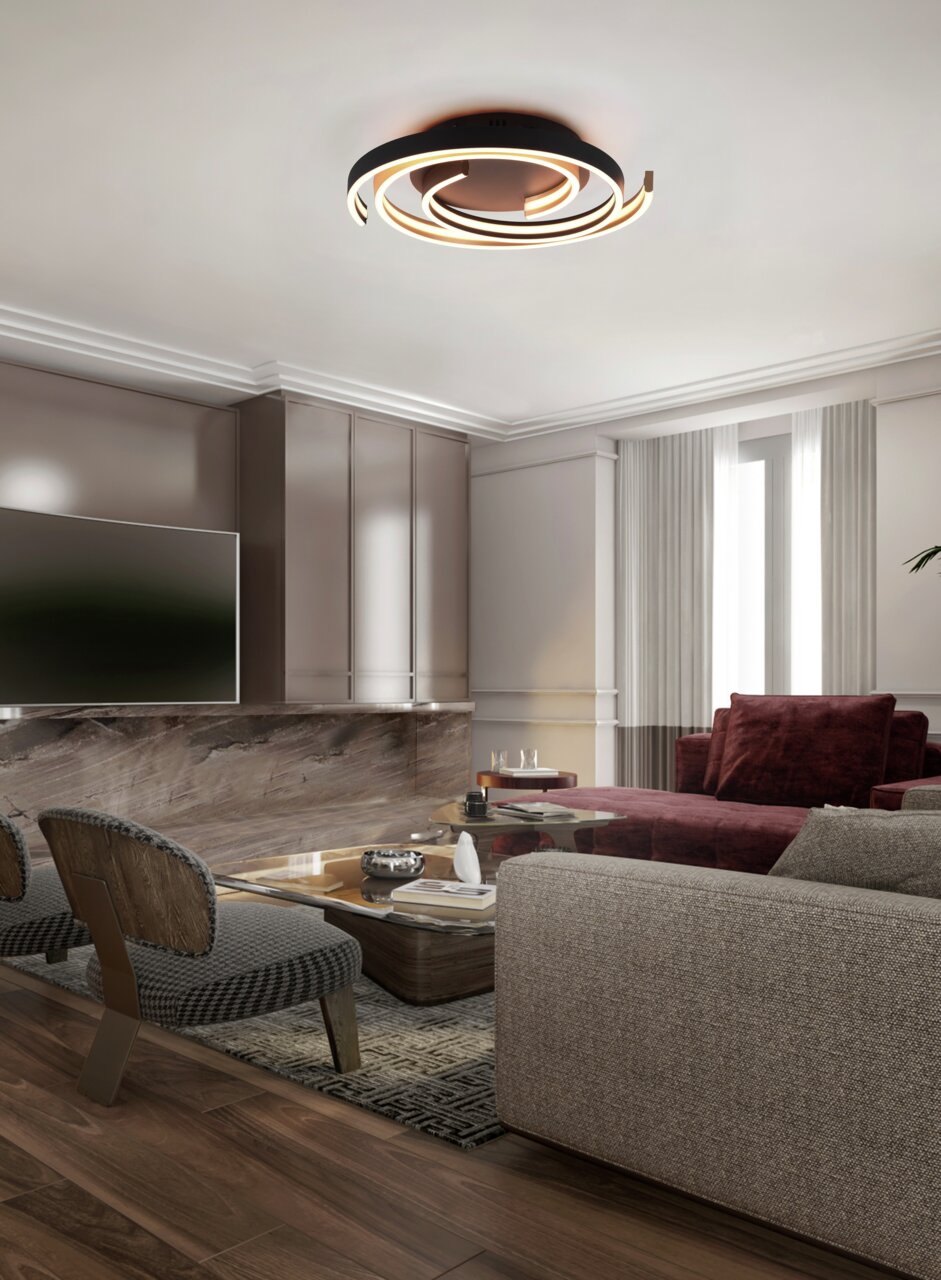 Moderne LED-Deckenleuchte CAYA in einem stilvollen Wohnzimmer, von unten betrachtet.