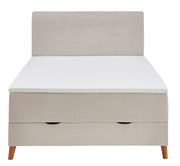 Boxspringbett in Frontalansicht mit gepolstertem Kopfteil und Holzfüßen