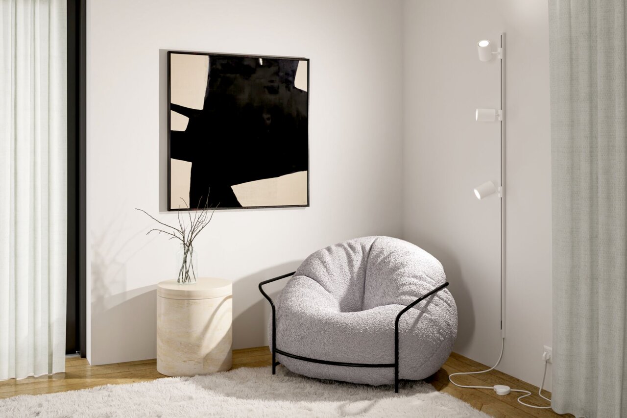 Moderne railspot Luxe in een stijlvolle woonkamer, aan de muur gemonteerd met drie verstelbare lampen, zijaanzicht.