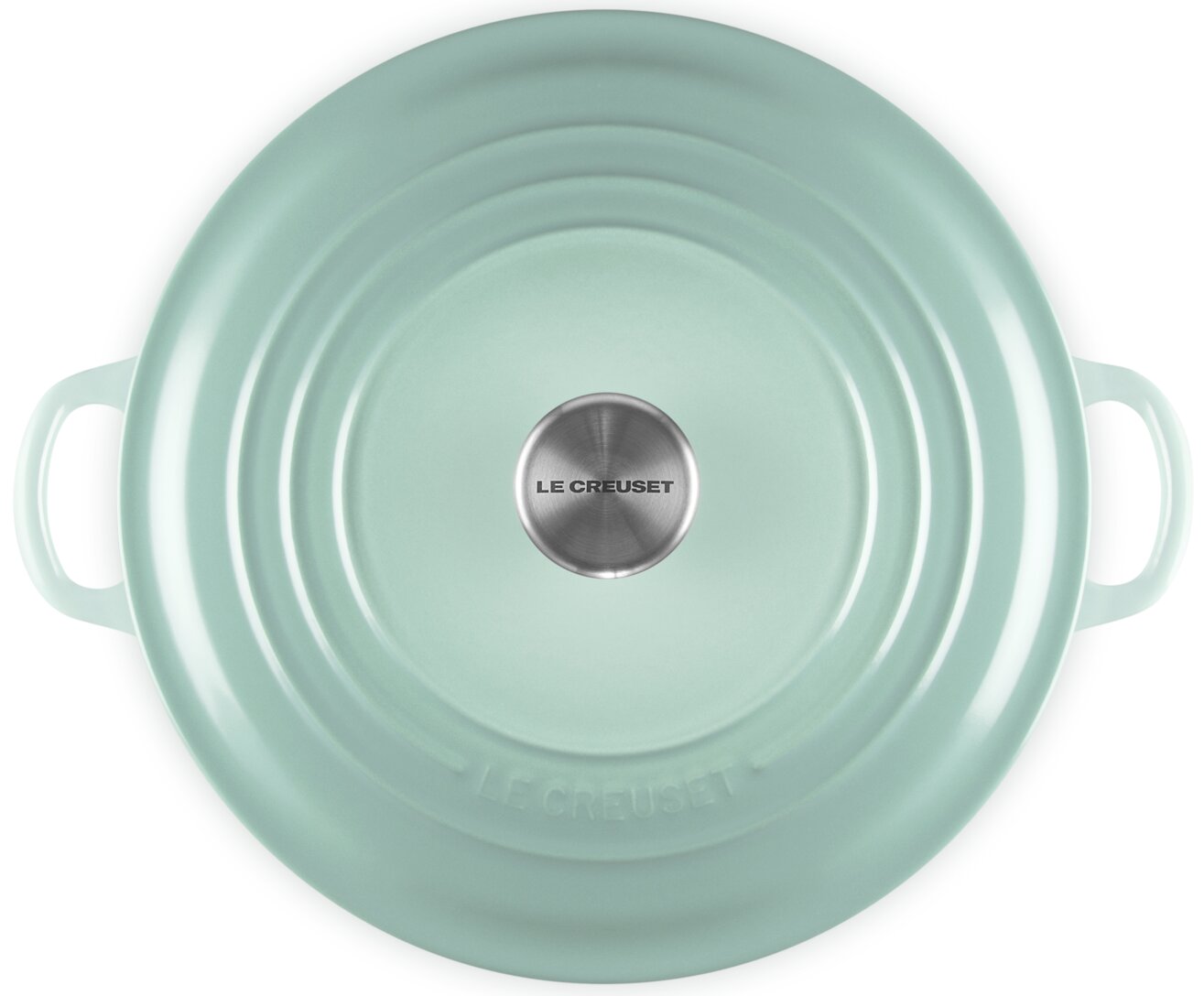 Runder Le Creuset Bräter/Topf mit Deckel in Mintgrün, mit zwei seitlichen Griffen und Metallknauf, Draufsicht von oben auf weißem Hintergrund