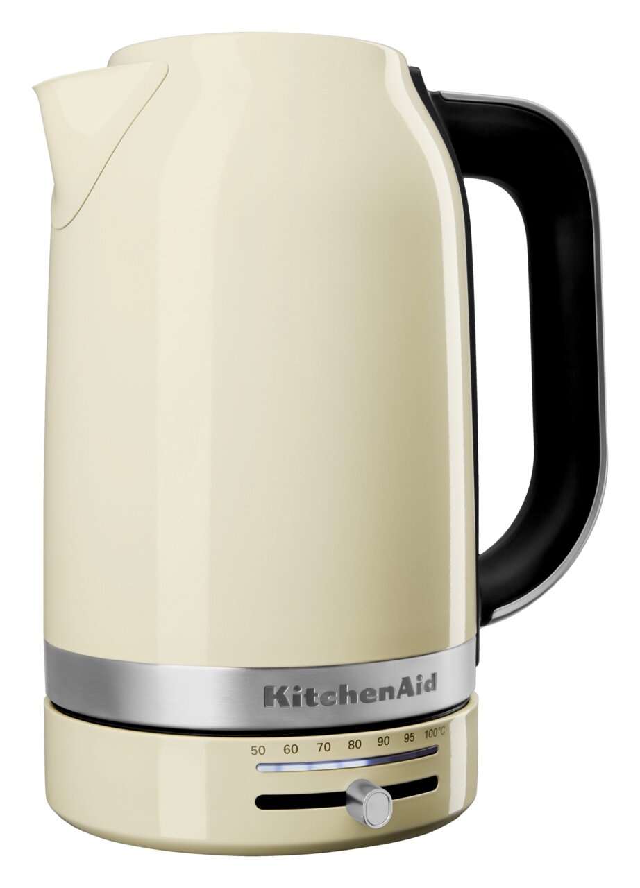 KitchenAid Wasserkocher Seitliche Ansicht eines cremefarbenen Wasserkochers mit schwarzem Griff und Temperaturregler.