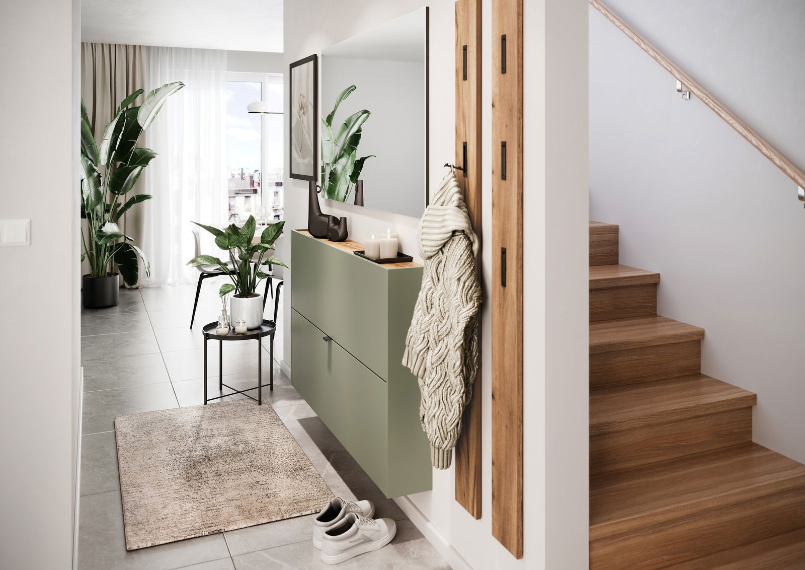 Moderner Flur mit grünem Schuhschrank, dekoriert mit Pflanzen und Kerzen, aus seitlicher Perspektive.