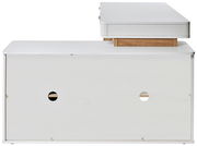 Eck-Schreibtisch mit Anbau in weißer Farbe, seitliche Perspektive, mit zwei runden Kabeldurchführungen auf der Rückseite.