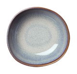 Obenansicht einer beige-blauen Müslischale mit gesprenkeltem Muster und braunem Rand.