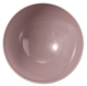 Ronde schaal met een diameter van 15,5 cm, van bovenaf gefotografeerd, in een zachtroze kleur met fijne concentrische cirkels.