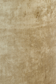 Nahaufnahme eines beigen Lampenschirms mit texturierter Oberfläche.