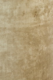 Nahaufnahme eines beigen Lampenschirms mit texturierter Oberfläche.