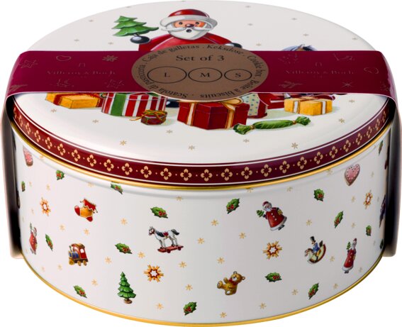 Runde Keksdose mit weihnachtlichen Motiven und rotem Band, seitliche Perspektive