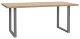 Moderner Esstisch mit Holzplatte und grauen Metallbeinen, seitliche Perspektive