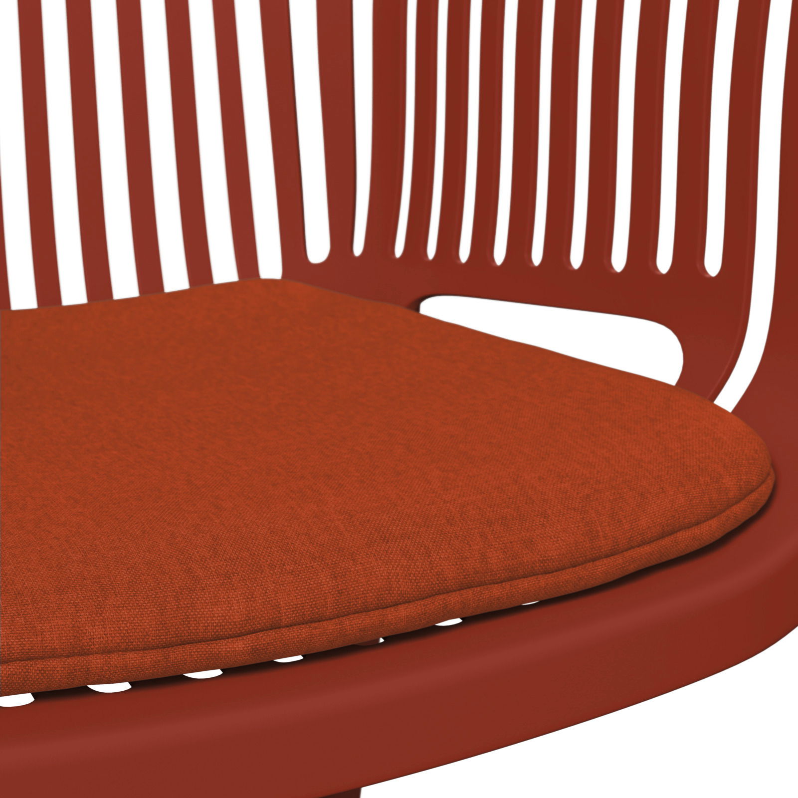 Nahaufnahme eines roten Stapelsessels mit gepolstertem Sitzkissen, seitliche Perspektive