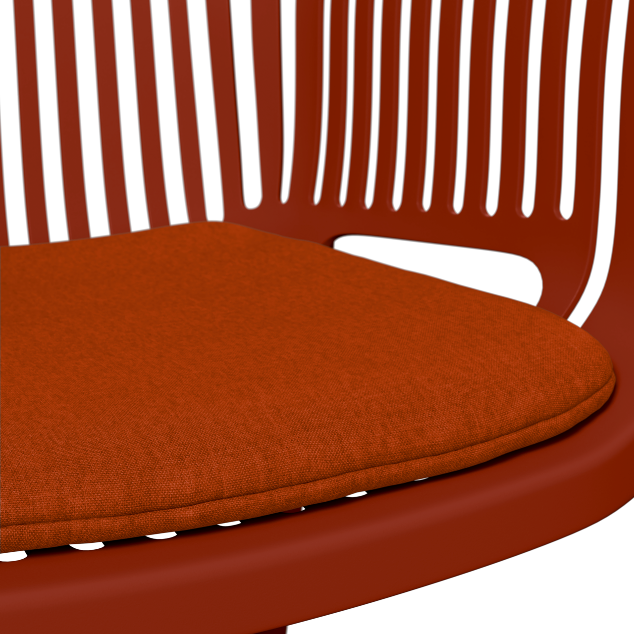 Nahaufnahme eines roten Stapelsessels mit gepolstertem Sitzkissen, seitliche Perspektive