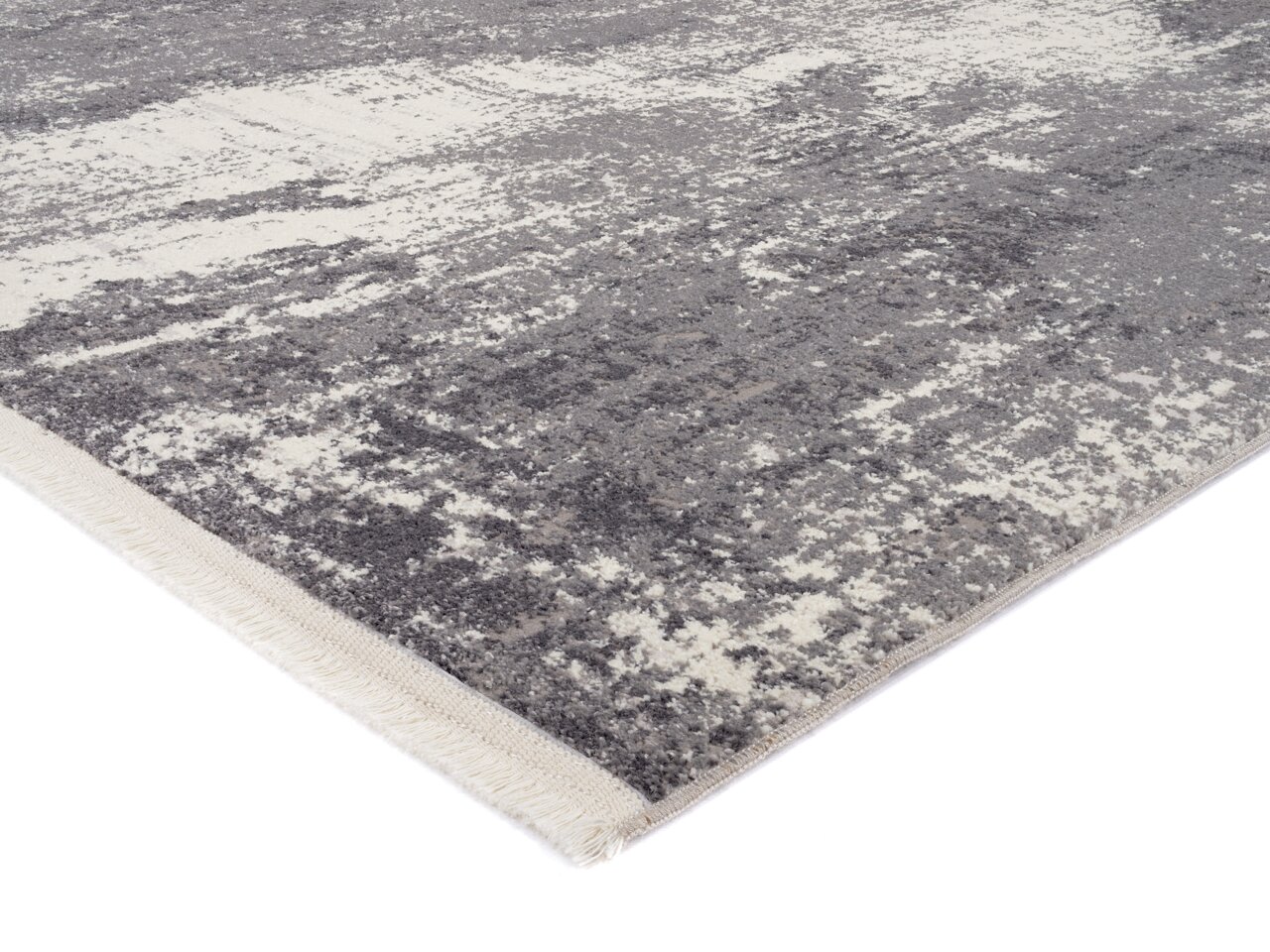 Designer Teppich in Grau- und Cremetönen, Nahaufnahme aus seitlicher Perspektive
