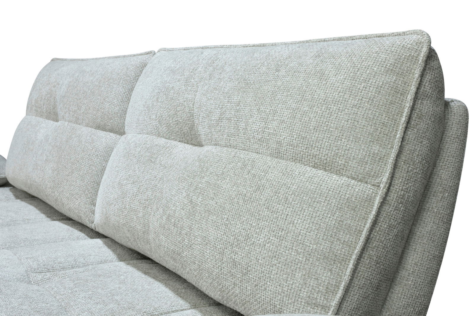 Nahaufnahme einer hellgrauen Longchairkombination mit weicher Polsterung und strukturierter Oberfläche, seitliche Perspektive.