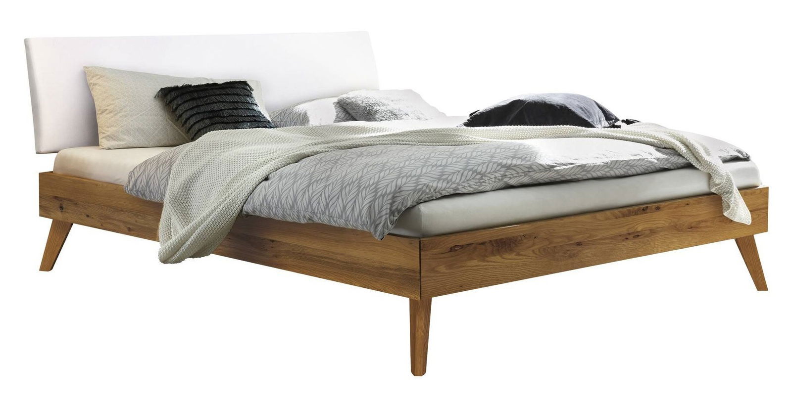 Modernes Bettgestell aus Holz mit weißem Kopfteil, seitliche Perspektive