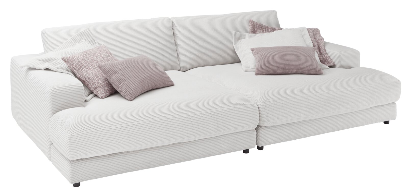 Megasofa klein in weißer Cordoptik mit mehreren Kissen, seitliche Perspektive
