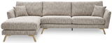 Ecksofa DETROIT von Musterring in beige-grauer Textur, Vorderansicht mit linker Ottomane und zwei Kissen.