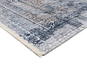 Teppich Vision Yama in Blau- und Brauntönen mit detailliertem Muster, Perspektive von der Ecke