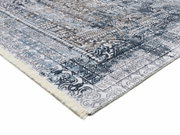 Teppich Vision Yama in Blau- und Brauntönen mit detailliertem Muster, Perspektive von der Ecke