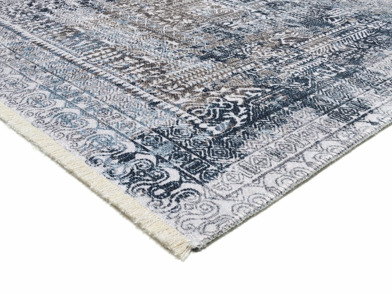 Teppich Vision Yama in Blau- und Brauntönen mit detailliertem Muster, Perspektive von der Ecke