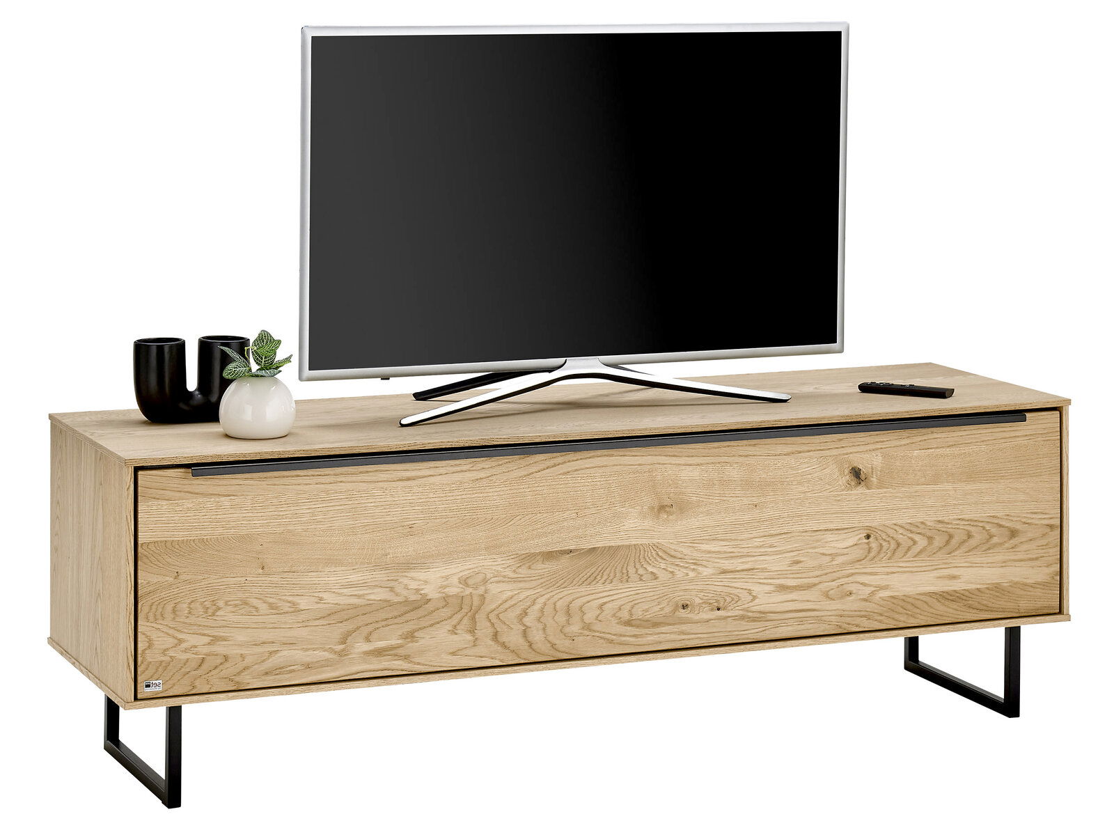 TV-Lowboard klein aus Holz mit schwarzem Metallgestell, darauf ein Fernseher, zwei Vasen und eine Fernbedienung, seitliche Perspektive