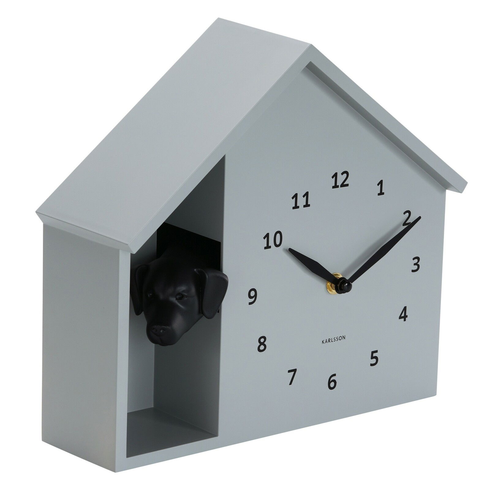 Wanduhr in Form eines Hauses mit einem Hundekopf, der aus einer seitlichen Öffnung schaut, seitliche Perspektive