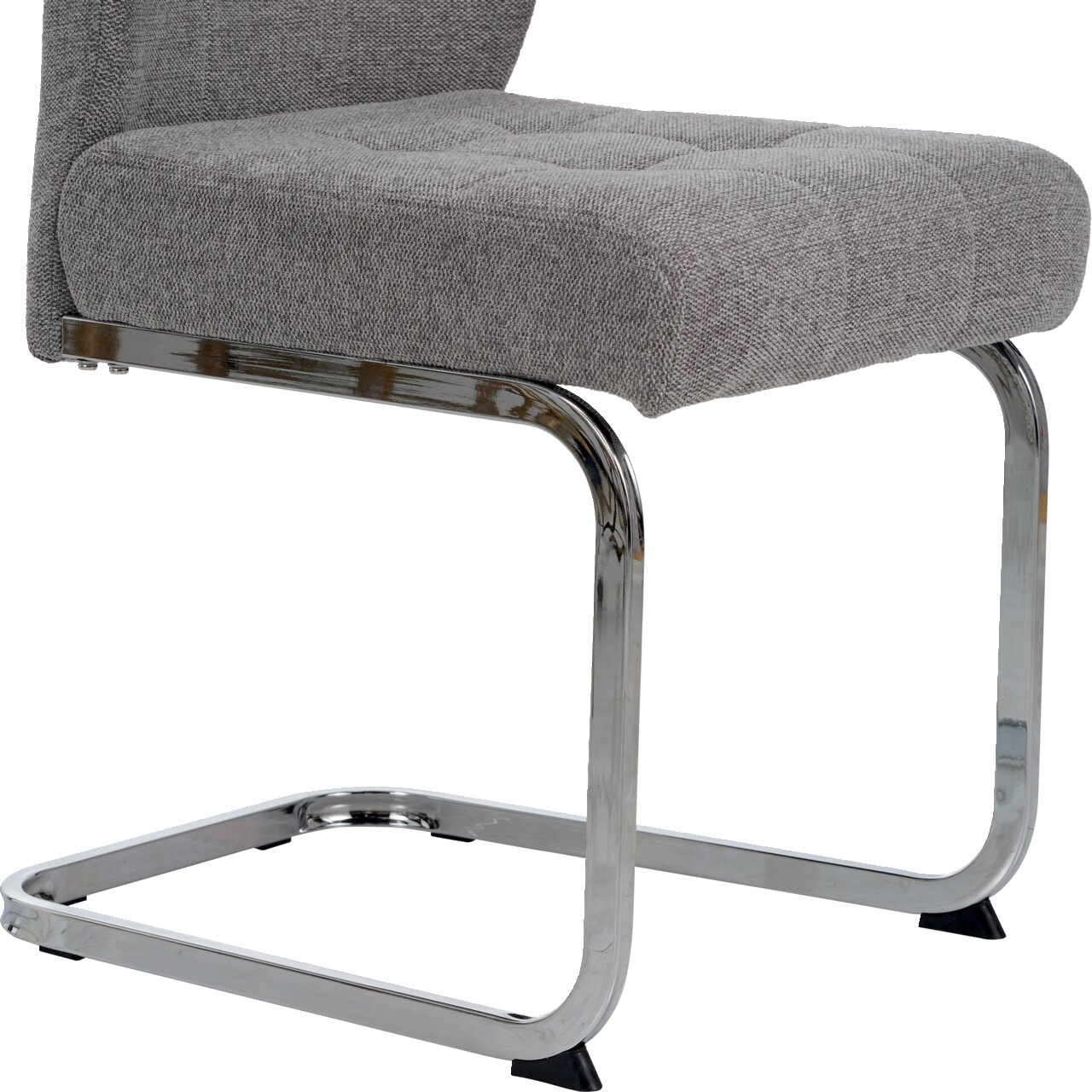 Grauer Schwingstuhl mit verchromtem Gestell, seitliche Perspektive