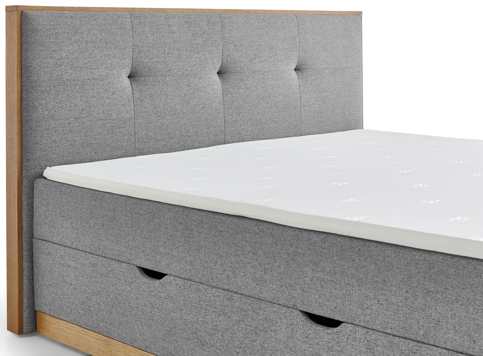 Graues Boxbett mit gepolstertem Kopfteil und Holzrahmen, seitliche Perspektive