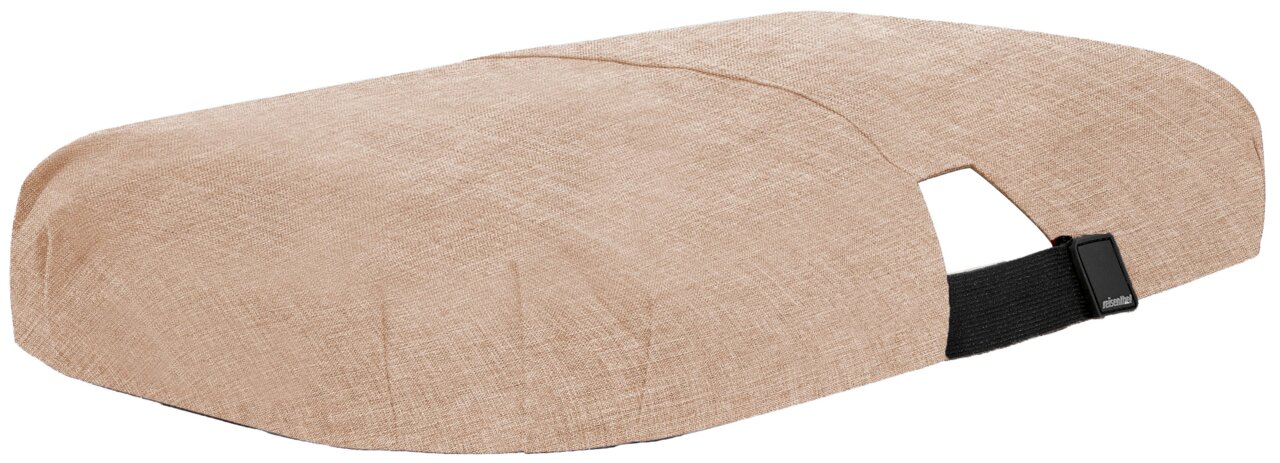 Beige Abdeckung für einen Korb mit seitlicher Perspektive, zeigt eine strukturierte Oberfläche und einen schwarzen Riemen mit Schnalle.