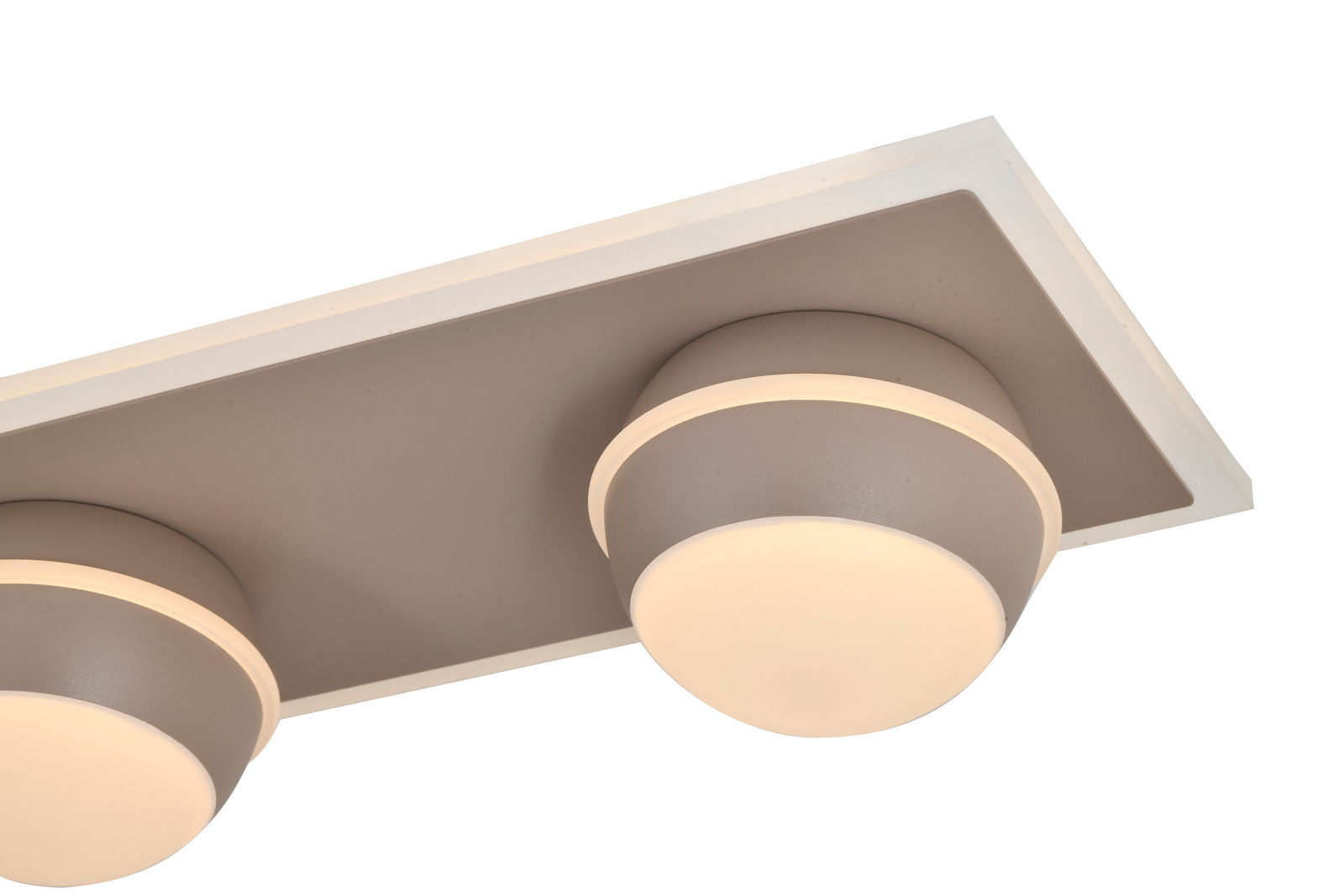 Nahaufnahme einer modernen LED-Deckenleuchte mit zwei runden Leuchtelementen auf einer rechteckigen Basis, seitliche Perspektive.