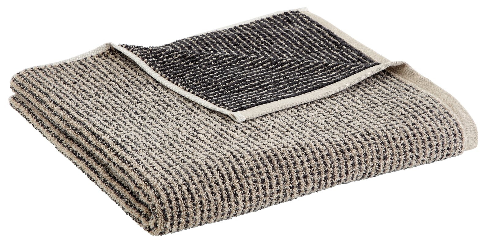 Gefaltetes Duschtuch in Beige und Schwarz aus seitlicher Perspektive