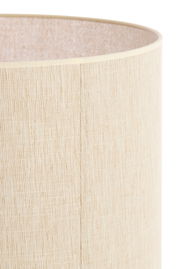 Nahaufnahme eines zylindrischen, beigen Lampenschirms mit texturierter Oberfläche.