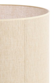 Nahaufnahme eines zylindrischen, beigen Lampenschirms mit texturierter Oberfläche.