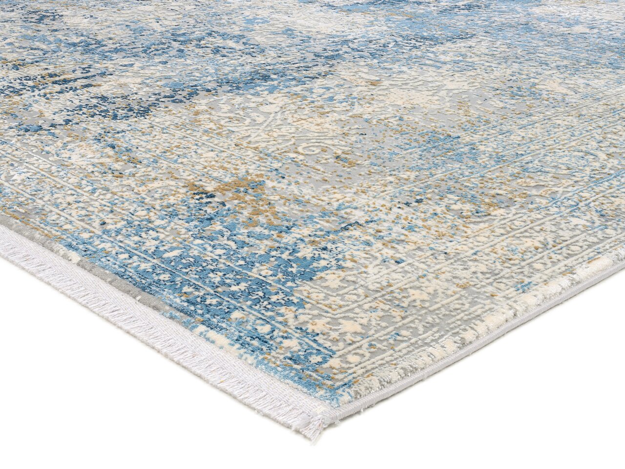 Designer Teppich in Blau- und Beigetönen mit detailliertem Muster, perspektivisch von der Seite aufgenommen.