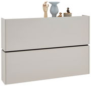 Moderner Hängeschuhschrank in hellem Beige mit Dekorationen auf der Oberseite, seitliche Perspektive