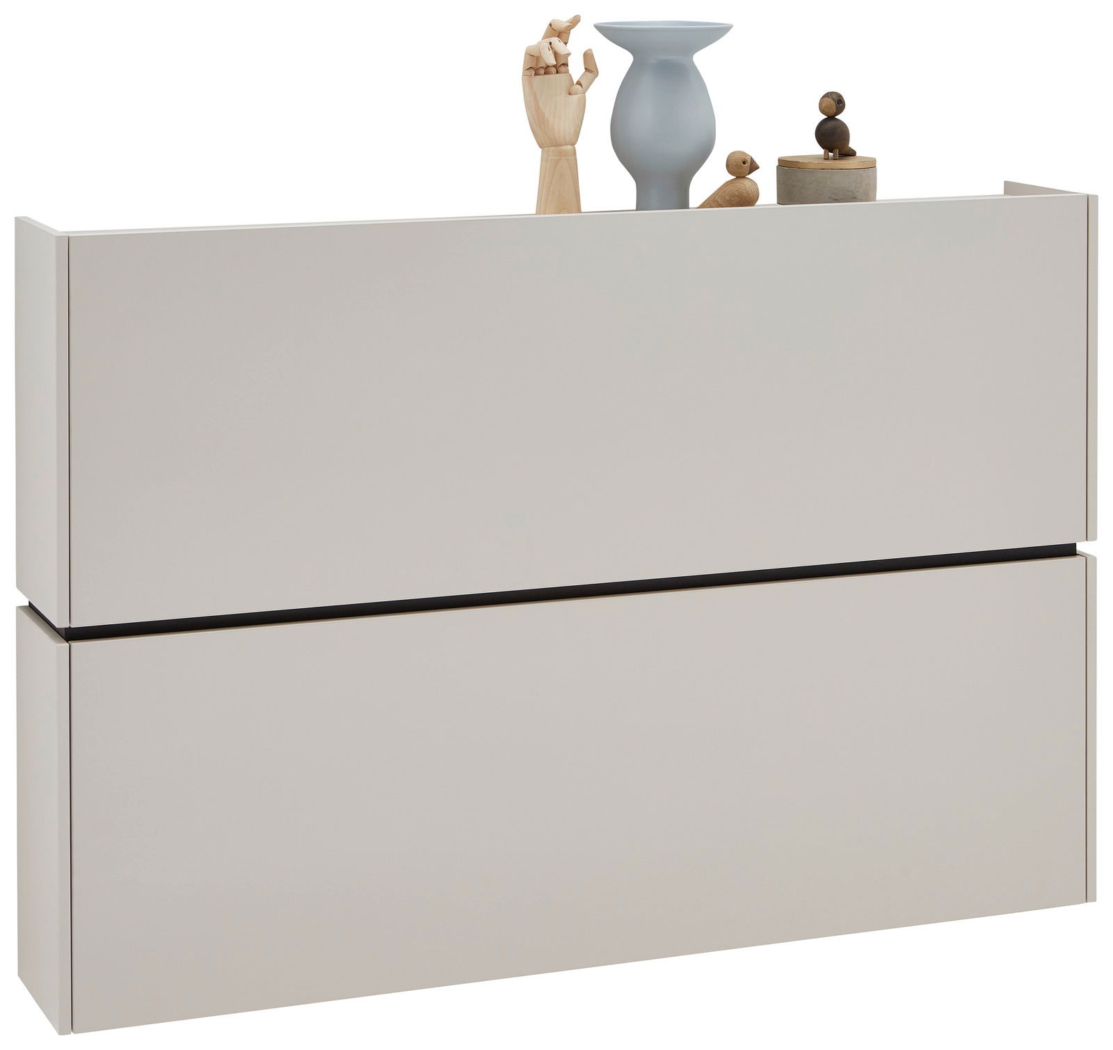 Moderner Hängeschuhschrank in hellem Beige mit Dekorationen auf der Oberseite, seitliche Perspektive