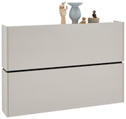 Moderner Hängeschuhschrank in hellem Beige mit Dekorationen auf der Oberseite, seitliche Perspektive