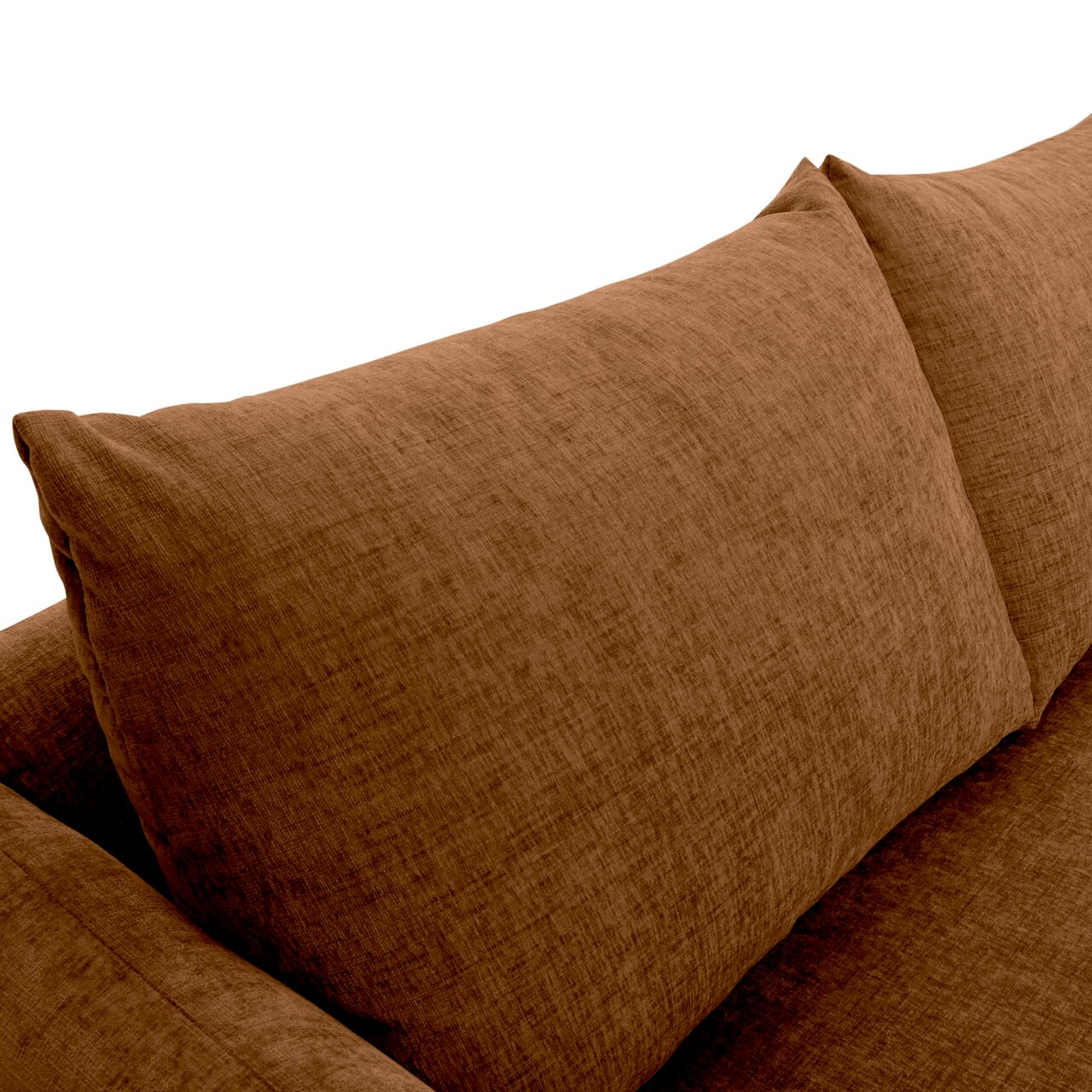 Nahaufnahme einer braunen Sofaecke mit weichen Kissen, Perspektive von oben.