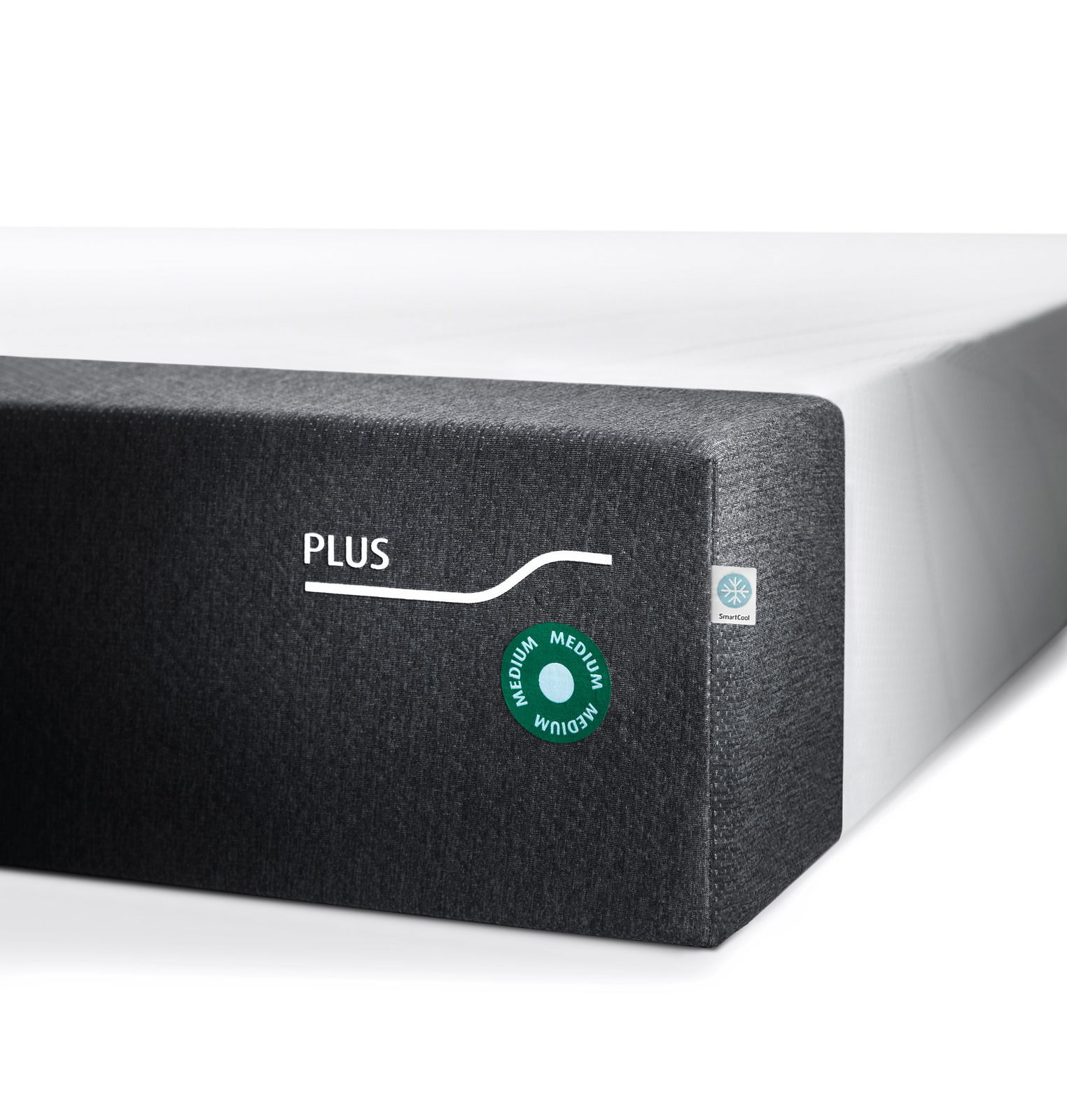 Tempur Viscomatratze 90x210 medium FORM PLUS MEDIUM Ecke einer Viscomatratze in mittlerer Festigkeit mit grauem Bezug und Aufschrift 'PLUS', seitliche Perspektive