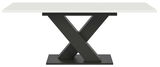 Moderner Esstisch mit weißer Tischplatte und schwarzem X-förmigem Gestell, Frontalansicht.